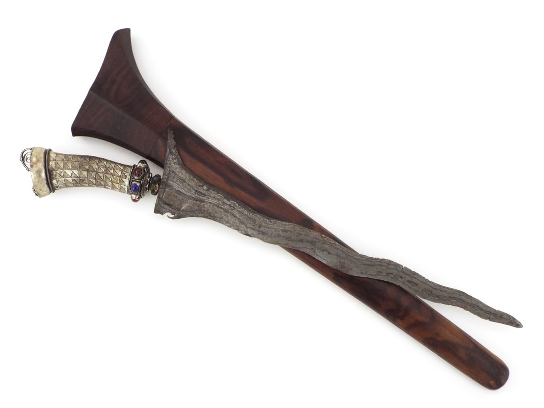 Beautiful Silver Balinese or Lombok KRIS Jeweled Dagger: Attractive antique Balinese or Lombok Kris knife. Sinuous double edged Damascus steel blade displays strong patterns with a few small edge chips from use. Silver hilt adorned with colorful precious st