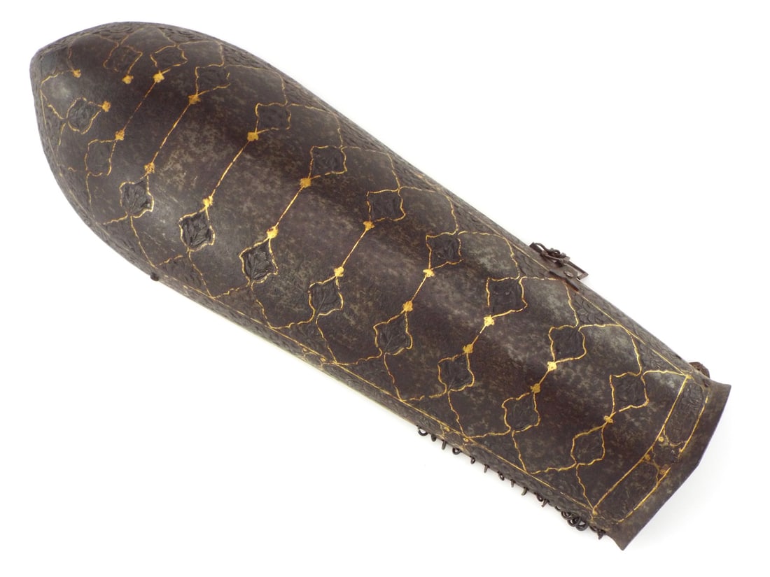 Rare 18th-19th C. Indo Persian BAZUBAND with Koftgari: Rare and impressive 18th-19th century Indo-Persian bazuband forearm defense. Curved steel plate richly adorned in koftgari gold with intricate floral and geometric patterns under mellowing patina.