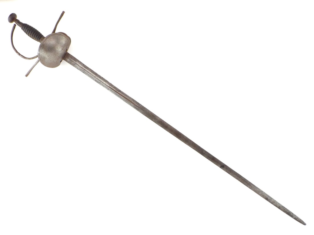 17th-18TH C. SPANISH CAVALRY BROADSWORD: 18TH CENTURY SPANISH CAVALRY SWORD with bilobate shell guard, iron cross guard and knuckle bow, fluted wood grip. Straight double edge blade, single fuller marked "VIVA EL REY" surrounded by delicate