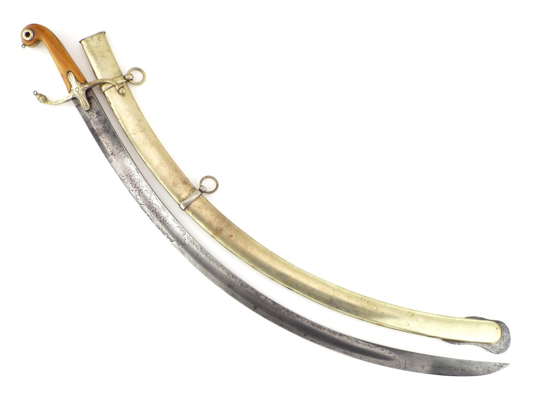 A Fine Early 19th C. British MAMELUKE Officer Sword: Fine early 19th century British Mameluke officer sword. Curved single edged blade engraved with floral scrolls and naval trophies of war, bears a greyish patina etched like ghosts of imperial campaign
