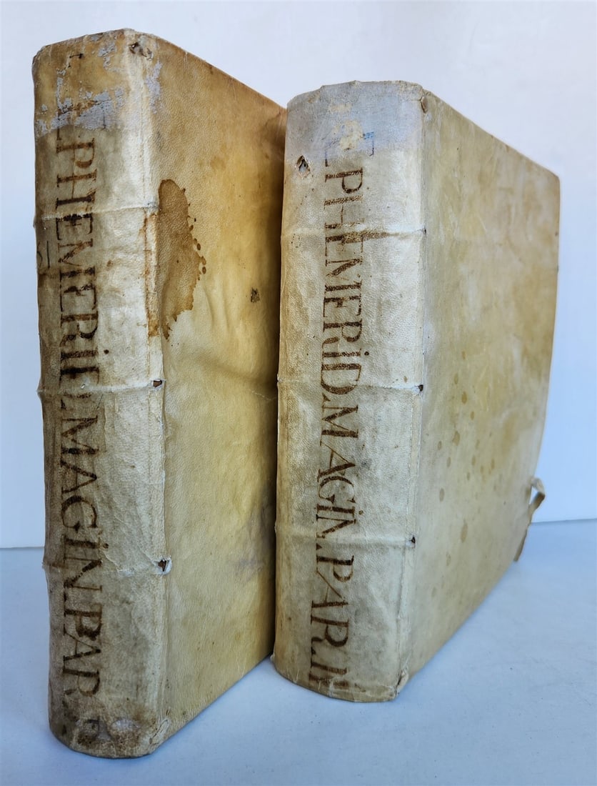 1582 ASTRONOMY & ASTROLOGY Ephemerides Coelestium Motuum ANTIQUE 2 vellum vols: Giovanni Antonio Magini (1555-1617). Ephemerides Coelestium Motuum. Venice: Apud Damianum Zenarium, 1582. First edition,. two large quarto volumes bound in uniform original limp vellum;. woodcut print