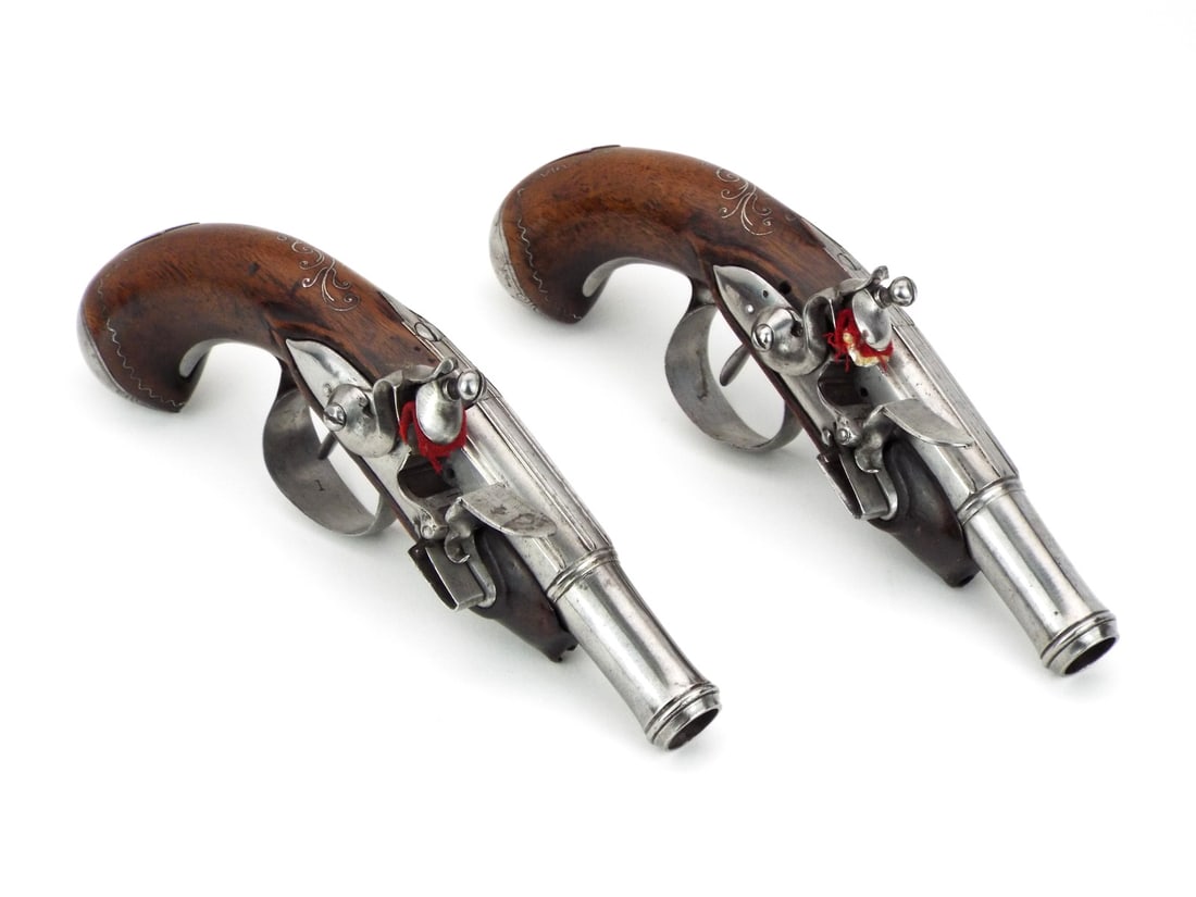 Superb 18th C. French FLINTLOCK GENTLEMAN'S PISTOL Pair Silver Inlaid: Elegant pair of late 18th century French gentleman's flintlock pistols encapsulates the refined taste of the ancien regime connoisseur, crafted for discreet personal defense with fixed smooth bore bar