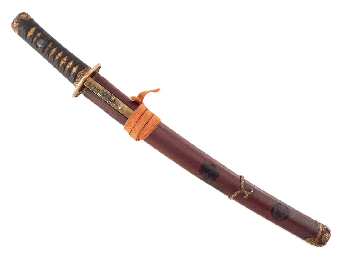 Fine Copper Mounted Hira Zukuri Wakizashi: This is a very healthy and well made Shin Shinto period hira zukuri wakizashi with a blade lavishly mounted in Higo or Hizen style stone textured copper mounts and a red brick like lacquered saya embe