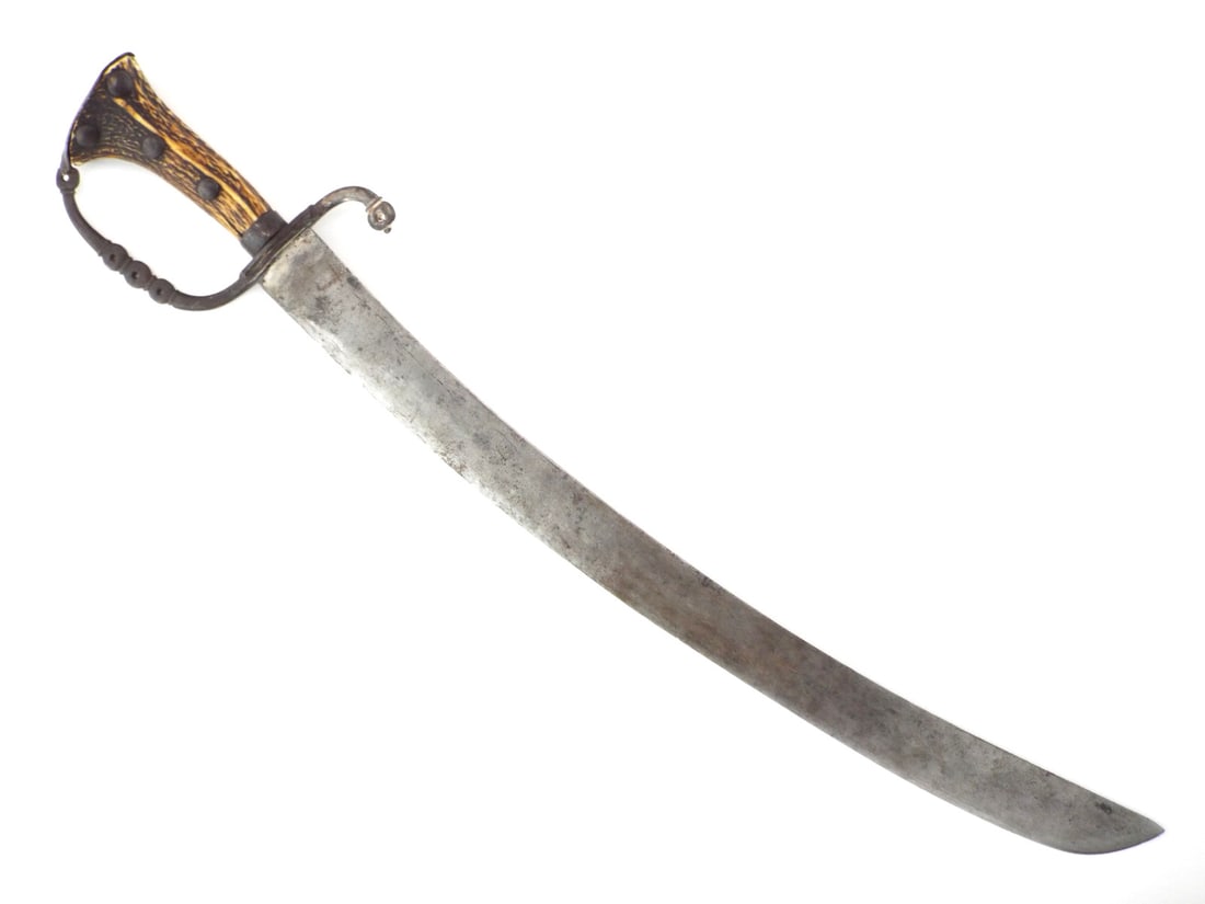 Spectacular 18th C. German HUNTING HANGER Rugged Stag Horn & Pierced Iron Hilt: Central European forestry heritage, this hanger embodies the utilitarian soul and rugged aesthetic of the late 18th century hunting tradition. The broad, single edged blade exhibits a curved profile o