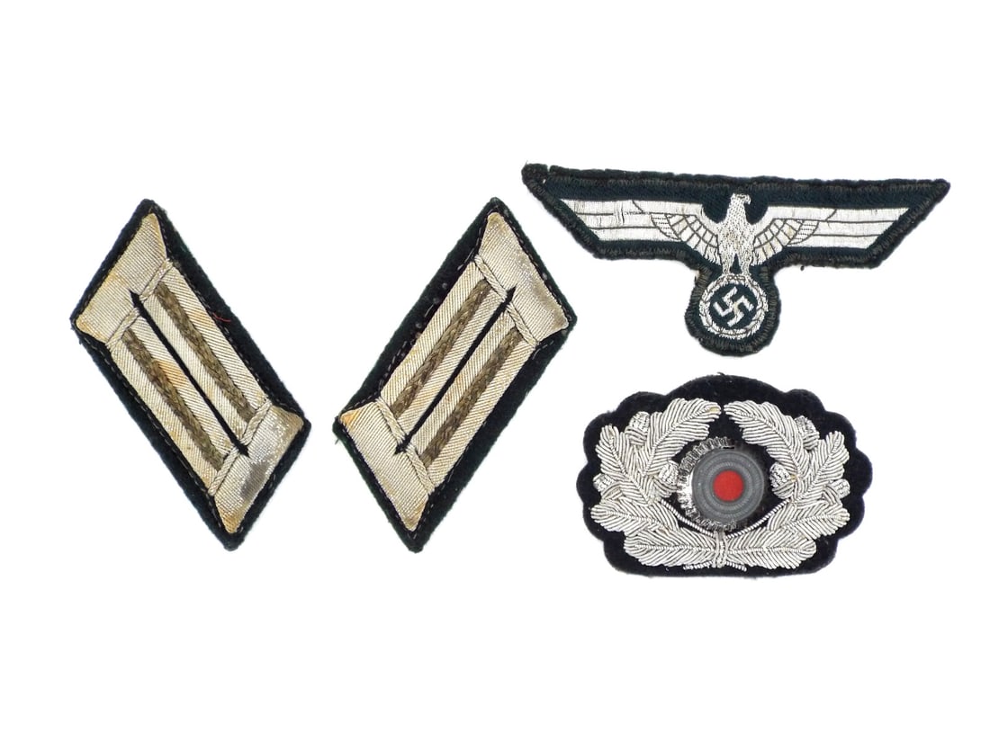 Lot of German WWII HEER OFFICER INSIGNIA: Embroidered silver bullion breast eagle shows tight stitching on dark green wool backing with minor fraying at the edges, matching pair of officer collar tabs exhibit uniform toning and use wear with