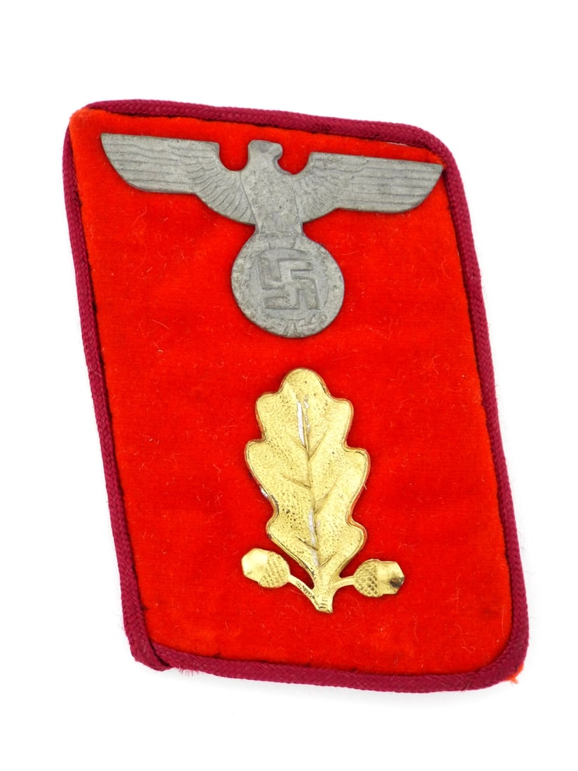 German WWII Regional GAULEITER SECTION LEADER COLLAR TAB: Bright red velvet body shows minor nap wear due to age. Fourth pattern zinc political eagle retains crisp feather detailing. Single gold washed aluminum oak leaf with dual acorns firmly attached via r