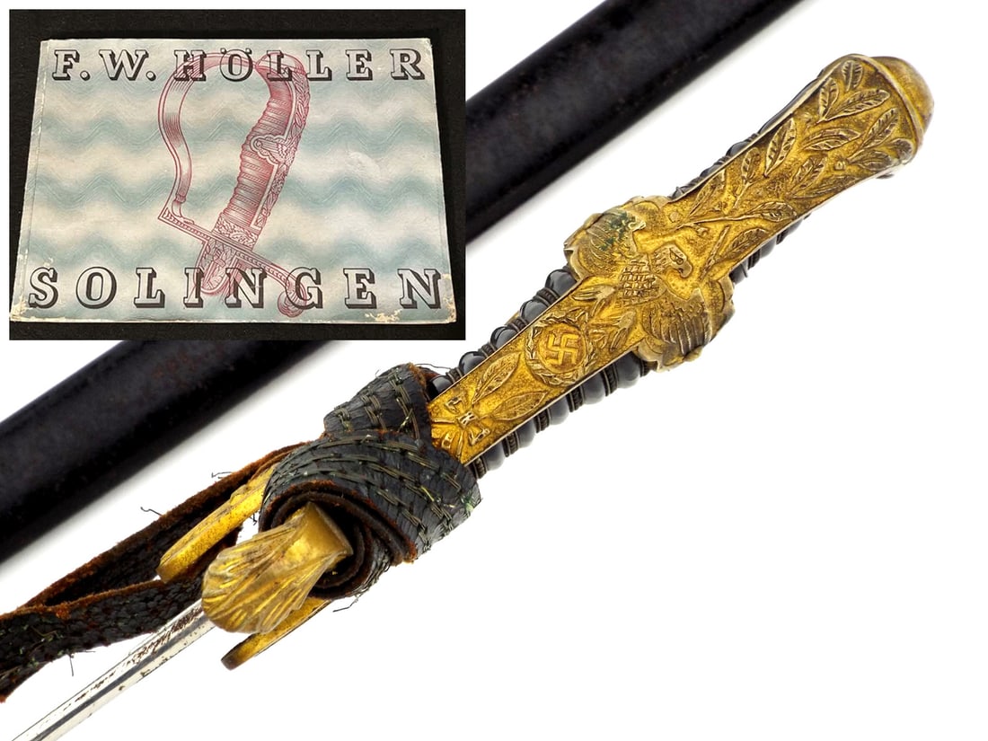 IMPORTANT German WWII Army Officer's Sword From 1941 HOLLER SOLINGEN Catalog Cover: Very scarce relic represents the evolution of the German dress sword, specifically the Nr. 7 Offizier-Sabel as documented on the cover of the 1941 F.W. Holler Solingen catalog of edged weapons. Only a