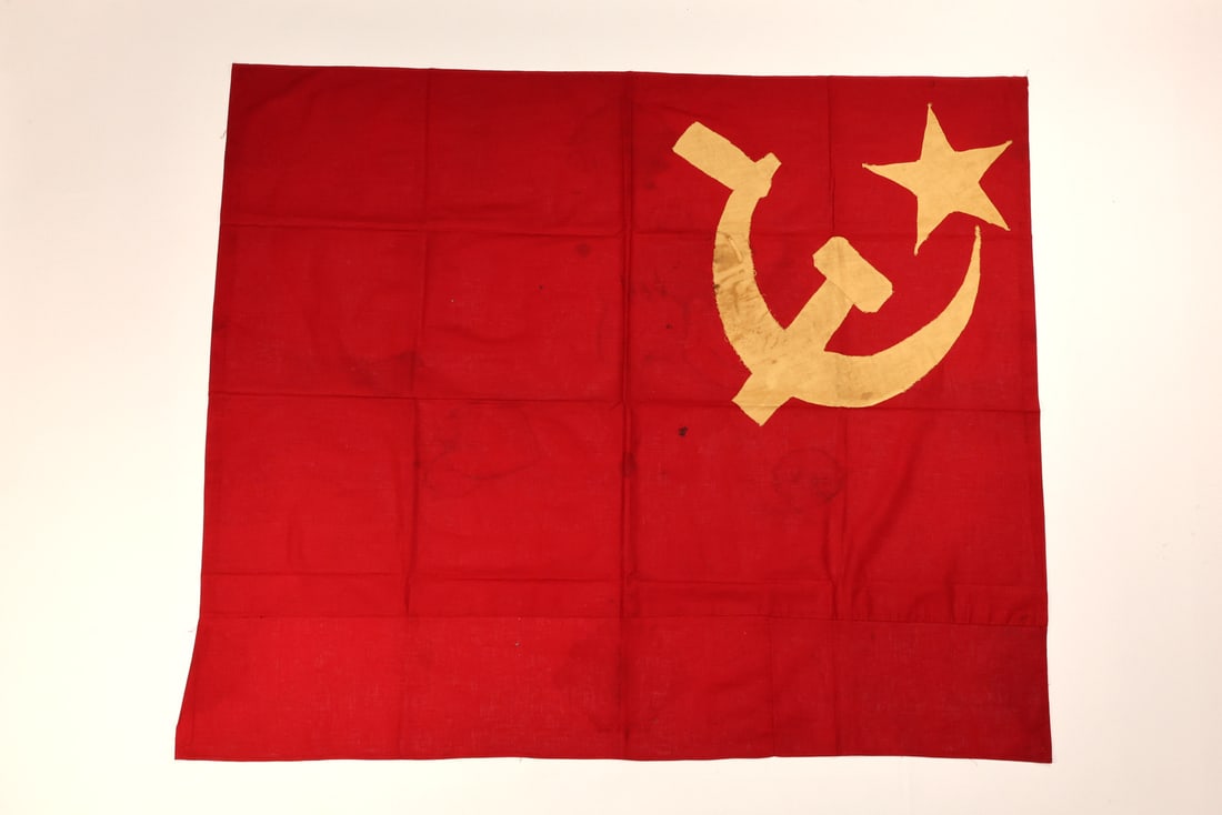 Museum Grade Historically Significant US Palmer FBI Raids Communist Party Flag: Museum grade red cotton bunting field displays a superb hand cut yellow textile star and sickle, demonstrating a primitive architectural geometry characteristic of early 20th century radical iconograp