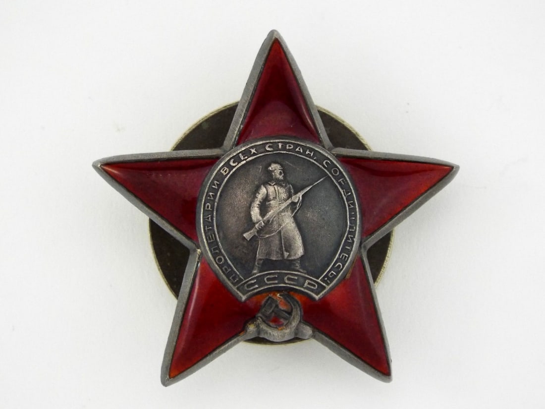 Soviet Union WWII Order of the Red Star: Military decoration, established in 1930. It is crafted from silver with red enamel coating the rays of the star.