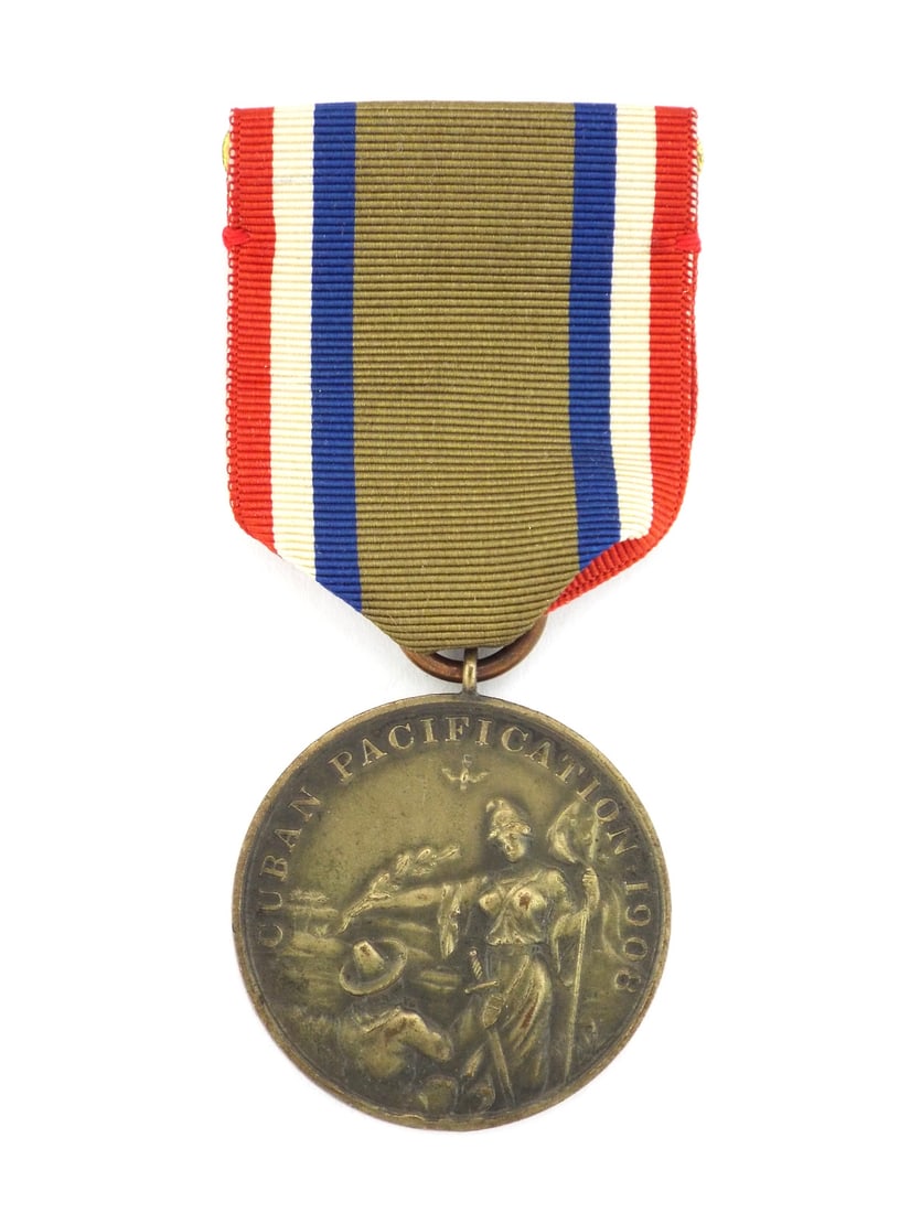 US 1906-1909 CUBAN PACIFICATION MEDAL Navy Service: Bronze planchet exhibits deep chocolate patina with moderate high point wear to Columbia figure and tropical landscape, obverse reads CUBAN PACIFICATION 1908. Reverse features sharp strike of eagle an