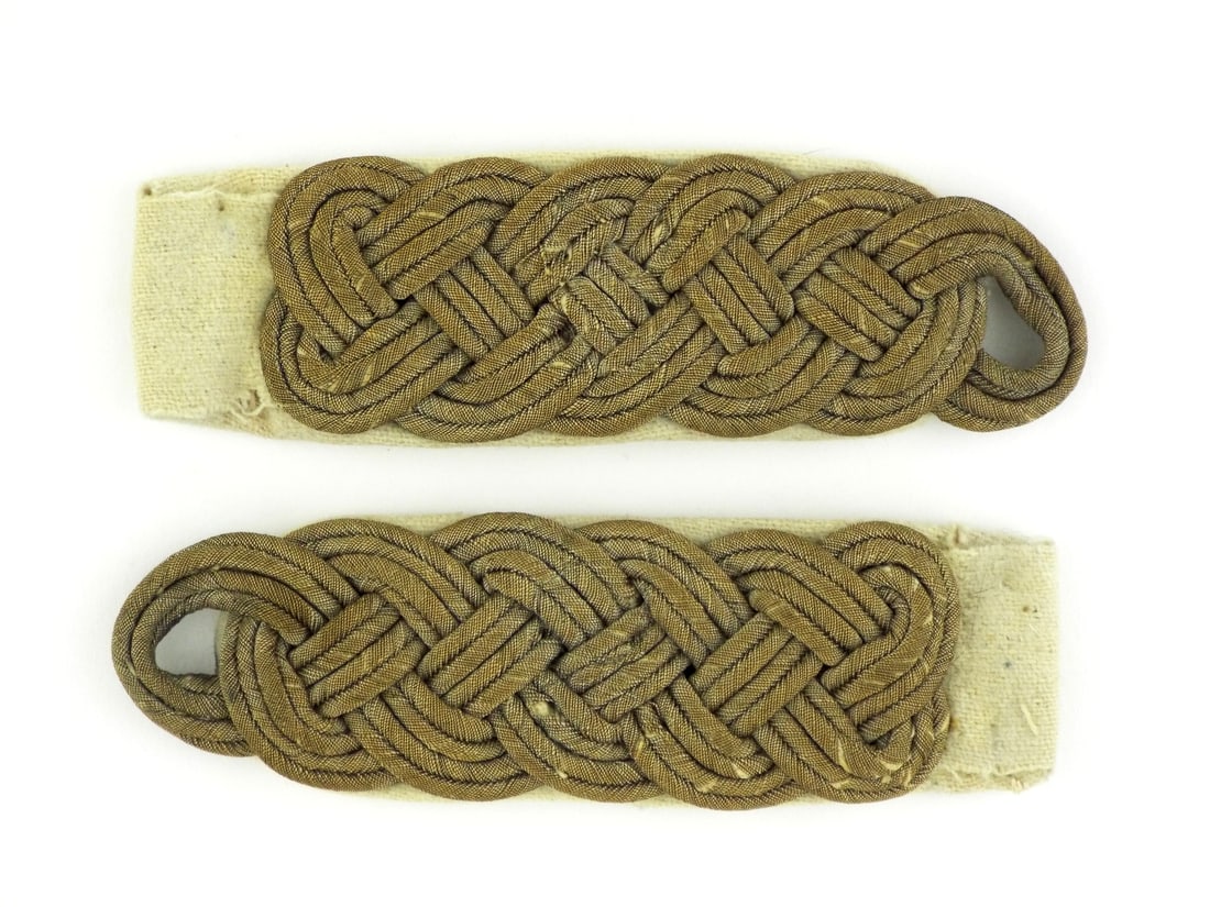 German WWII GENERALMAJOR SHOULDER BOARDS Interlaced Cords: Textile body features a triple row plaited configuration of dulled gold bullion wire exhibiting an honest, heavy patina consistent with field wear. Each board is constructed with a distinctive interla