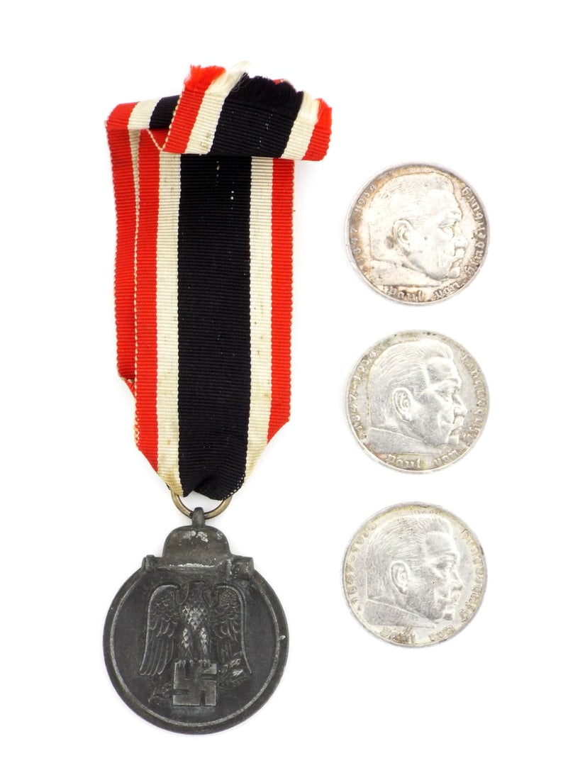 Lot of German WWII WINTER BATTLE MEDAL & 3 Silver Reichsmarks: Eastern Front Medal showing moderate edge wear, even dark patina and intact ribbon. Group includes three silver 5 Reichsmark coins dated 1935 and 1936. Coins exhibit circulated patina and various surf