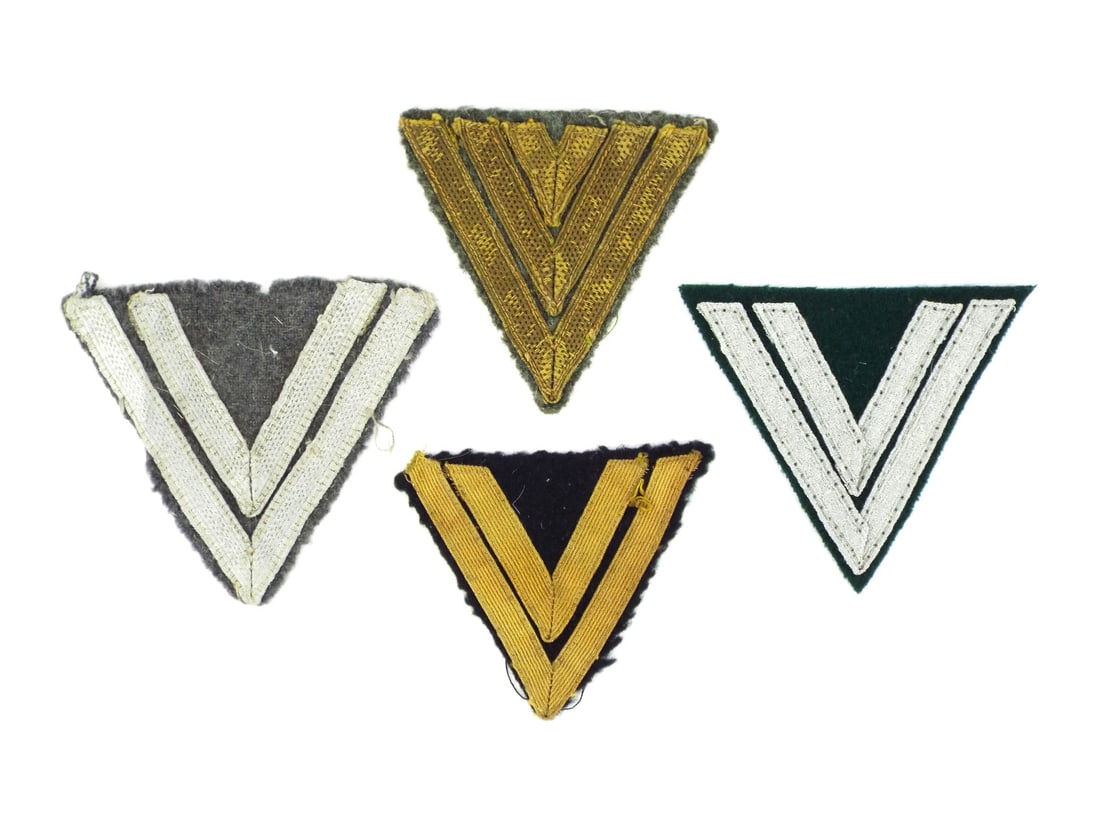 German WWII SLEEVE RANK CHEVRONS Patches: Assortment of four NCO and enlisted rank chevrons, showing moderate edge fraying. All pieces exhibit stitch marks and uniform removal wear.