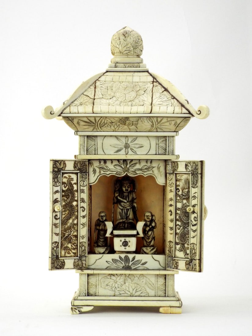 Fine Japanese Meiji TRAVEL SHRINE Bone Inlays & Dragon Carvings: Architectural body features a hipped roof with a lotus finial and one missing corner eave. Ink stained carvings depict dragons on door interiors. The central recessed chamber houses a carved deity and