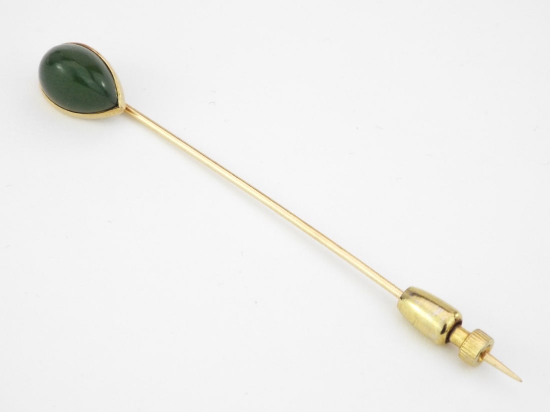 Jade 14K Yellow Gold Pin: Jade 14K Yellow Gold Pin, Weight 1.5g. Direct credit card payment will not be accepted for this Lot. Accepted payment methods include cash, certified bank check, wire transfer, and ACH.