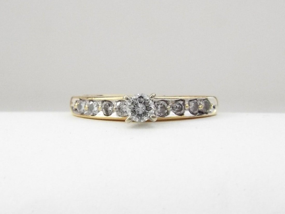 14K Yellow Gold Diamond Ring: 14K Yellow Gold Diamond Ring, Diamond 55 points, Weight 3.1g. Direct credit card payment will not be accepted for this Lot. Accepted payment methods include cash, certified bank check, wire transfer,