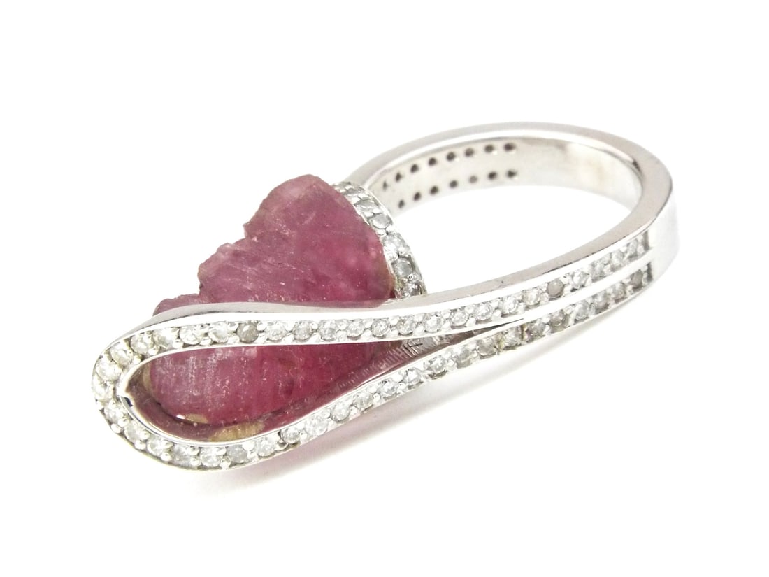 14K White Gold Carved Amethyst Statement Ring with Natural Diamond Bypass Band: 14K White Gold Carved Amethyst Statement Ring with Natural Diamond Bypass Band, Weight 10.9g, Size 6. Direct credit card payment will not be accepted for this Lot. Accepted payment methods include cas