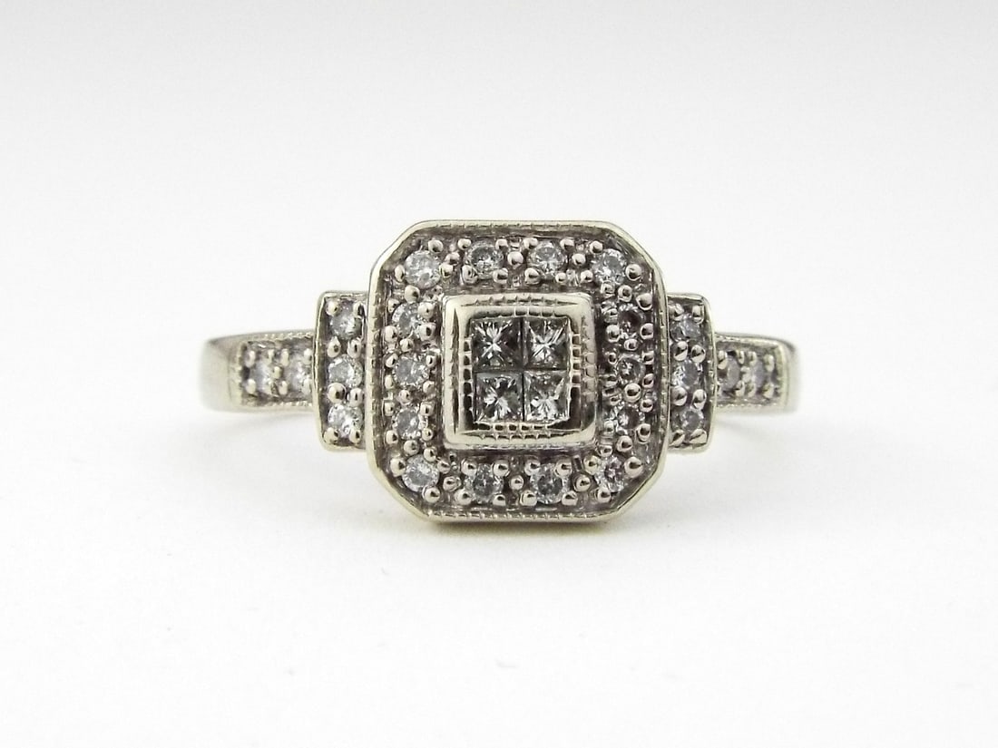 10K White Gold Natural Diamond Rectangle Cluster Engagement Ring: 10K White Gold Natural Diamond Rectangle Cluster Engagement Ring, Diamonds 0.20tcw, Weight 2.9g, Size 7.75. Direct credit card payment will not be accepted for this Lot. Accepted payment methods inclu
