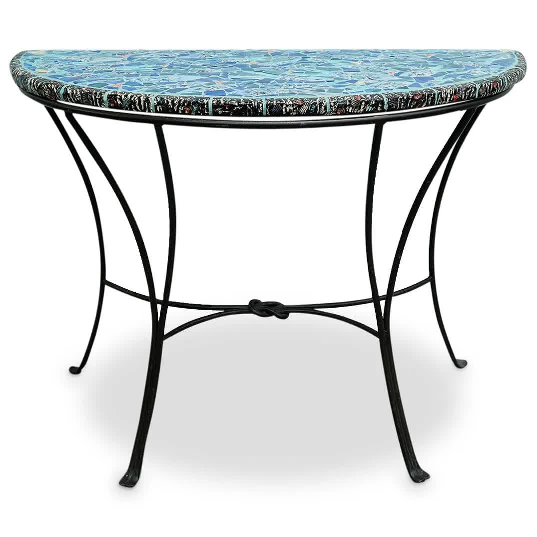 Carlos Alves Miami Mosaic Ceramic Credenza: Mosaic credenza by Carlos Alves featuring a textured outline around the top perimeter framing textured fish, shellfish, and flower designs among light blue tile fragments. Carlos Alves is a Cuban