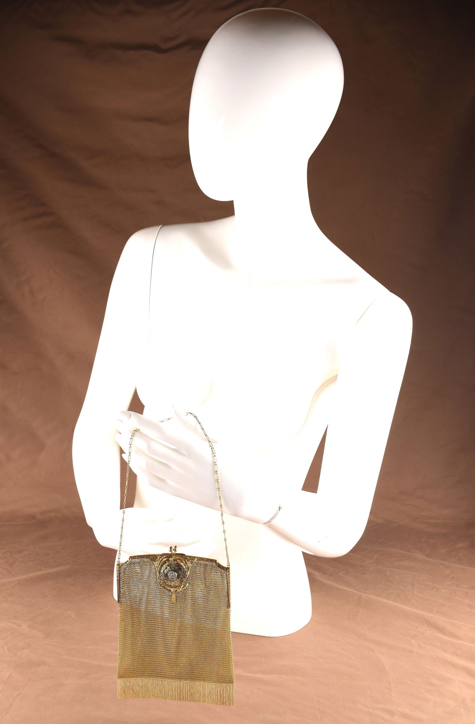 14k Yellow Gold Mesh Bag: The Whiting & Davis Co. Mesh Bag is a luxurious vintage accessory perfect for a special occasion like a Little Black Dress. This evening bag features a beautiful diamond, sapphire, and locket detail,