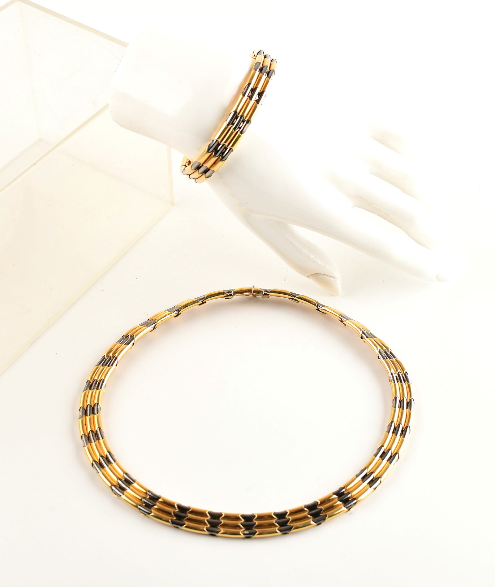 Two-tone 18K White and Yellow Gold Link Necklace and Bracelet Set: Two-tone 18K White and Yellow Gold Link Necklace and Bracelet Set, Brand Adriana Chimento, Weight 104.9g. Direct credit card payment will not be accepted for this Lot. Accepted payment methods include