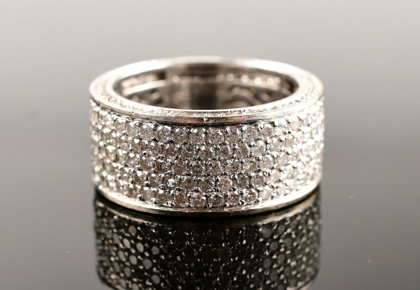 14K White Gold Wide Diamond Pave Band Ring: 14K White Gold Wide Diamond Pave Band Ring, Diamonds 3tcw, Color H, Clairy I, Natural, Size 10 1/4, Weight 14.2g. Direct credit card payment will not be accepted for this Lot. Accepted payment
