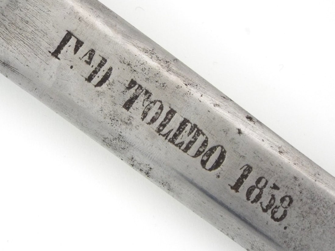 Spanish TOLEDO PLUG Bayonet Fabrica de Toledo Dated 1858: Spanish plug bayonet, bearing the prestigious mark of the historic Fabrica de Toledo on its blade and the year of manufacture. Full length 17 inches, blade length 12 inches.