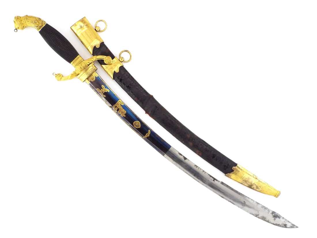 Grand French Napoleonic Wars 1st Empire captain's naval dirk with exceptional blade: An epic French naval officer's dirk from the first quarter of 19th century; stunning exhibition grade object over 200 years of age. Complete in its gilt mounted scabbard, chequered horn grip and lion'