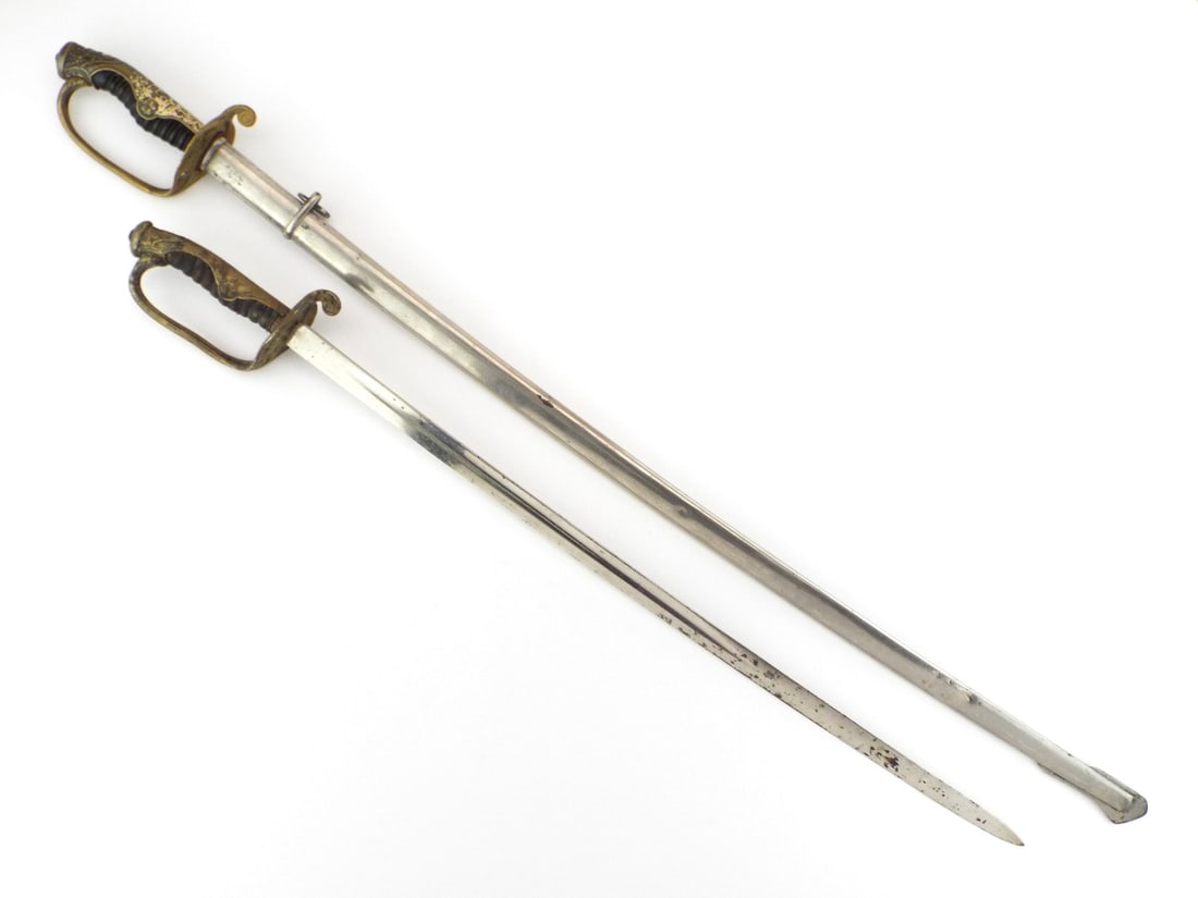 Pair of Japanese MEIJI-TAISHO Type 19 OFFICER SWORDS: Pair of Imperial Army Kyu-Gunto featuring cast brass D-guards with cherry blossom ornamentation and black grips with wire wrap, one matching steel scabbard. Full length 34.5 inches, blade length 29 in