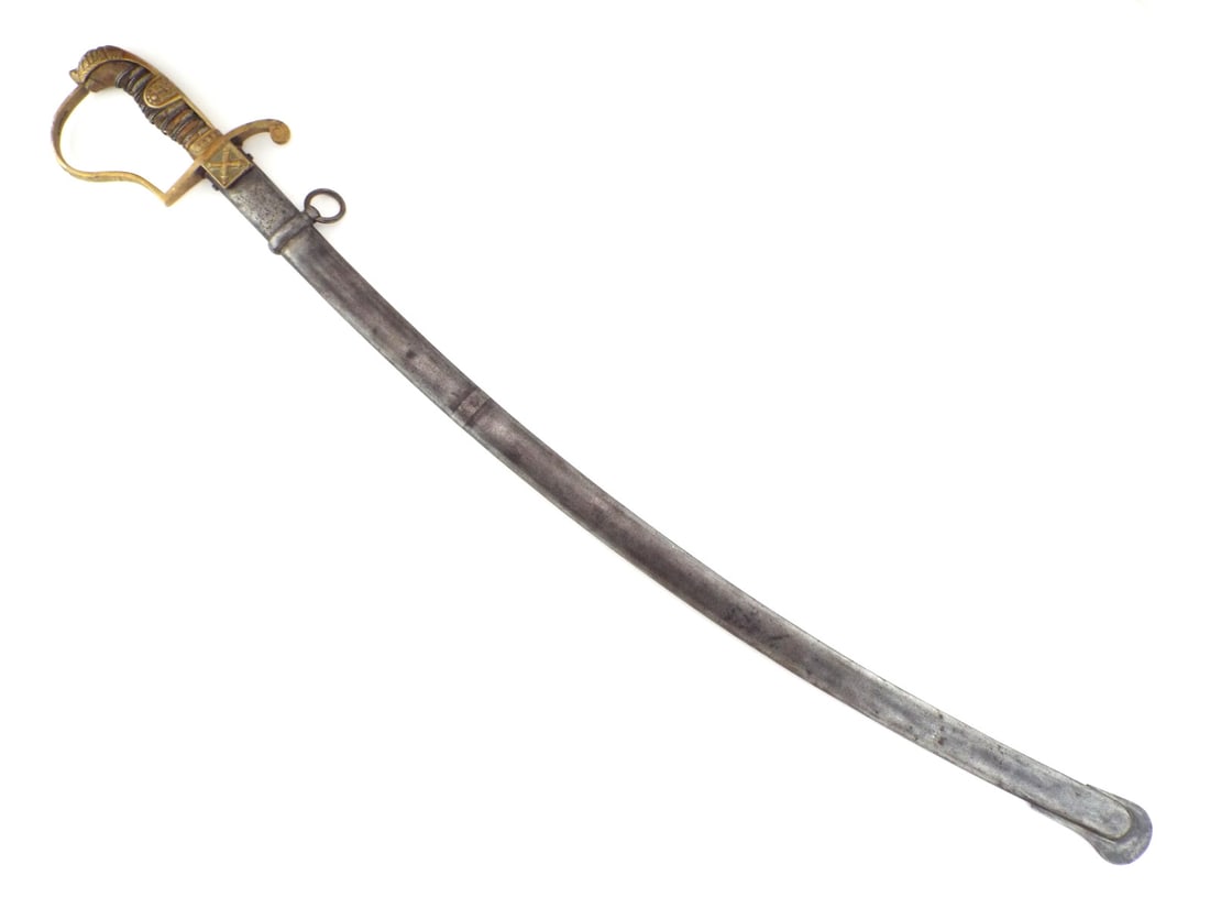 Imperial German WWI Artillery Officer Sword LION HEAD & UNIT MARKINGS: Single fullered curved steel blade shows age toning and localized oxidation with Solingen maker marks to ricasso. Gilded brass hilt features lion head pommel, wire wrapped shagreen grip with heavy los