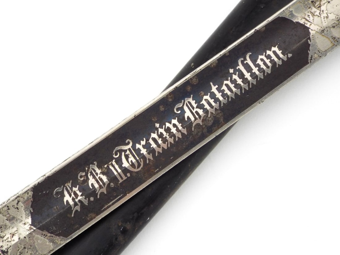 Imperial German WWI TRAIN TROOPER SWORD with Logistics Unit Inscriptions: Polished steel blade shows lifting to nickel with localized oxidation throughout engraved motifs including In Treue Fest - In Loyalty Steadfast, and unit attribution B. 1. II. Train Bataillon - Bavari