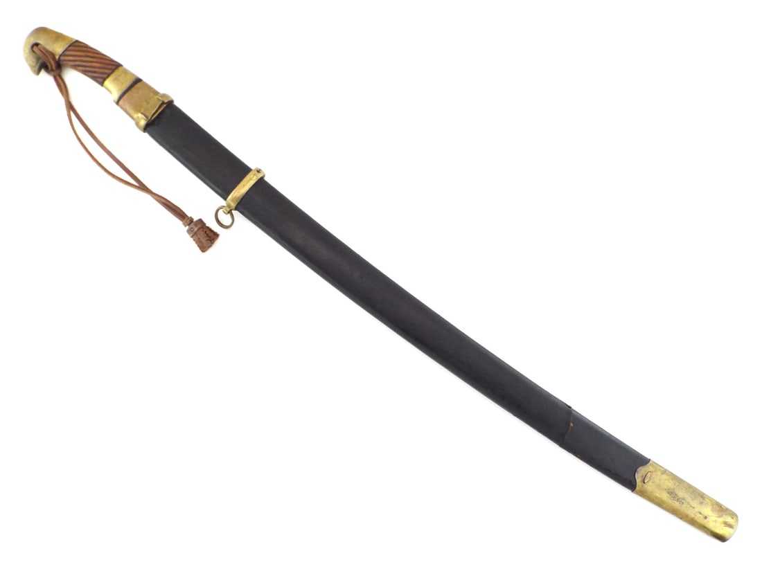 Seldom Encountered Soviet WWII Russian Officer ZLATOUST SHASHKA SWORD Dated 1944: Single edged steel blade shows light surface oxidation and age appropriate mottling with deep ZiK and 1944 stamps. Diagonal grooved wooden grip remains solid beneath brass pommel featuring Soviet USSR