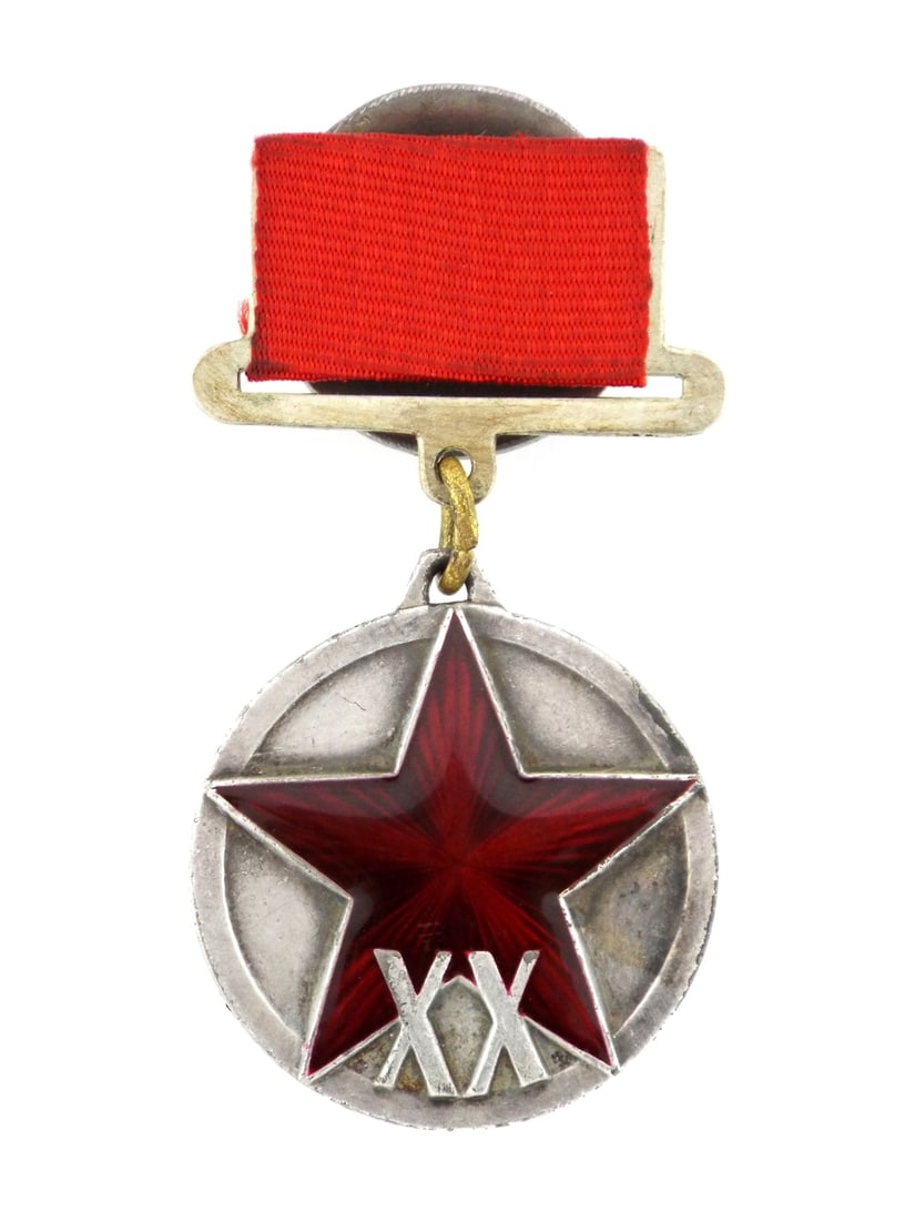 Rare Soviet 1938 RED ARMY XX JUBILEE Medal in Silver & Enamel: Oxidized silver planchet shows localized contact marks and characteristic patina. Red enamel star remains intact with visible radial guilloche, though exhibiting minor surface abrasions. Roman numeral