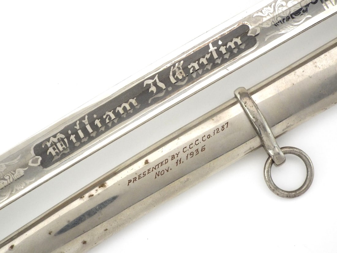 Rare US 1930S CCC PRESENTATION SWORD with Provenance: This sword represents a rare physical link to the Civilian Conservation Corps era when Army officers managed New Deal relief camps. Presented to Captain William J. Martin on Armistice Day 1936 by the 