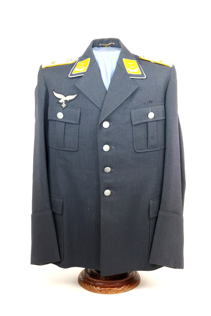 German WWII Luftwaffe First Lieutenant Tunic with Knights Cross Connection: Made to order by a customer named "MEISEL" and dated April 1, 1937, this four pocket Luftwaffe tunic still remains in excellent condition. Slightly rubbed and worn, but easily legible, it retains its 