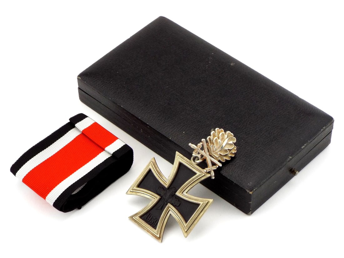 Very Fine Medal COPY of Knight's Cross with Oak Leaves and Swords by C.E. Juncker: Very Fine Copy Knight's Cross of the Iron Cross with Oak Leaves and Swords by C.E. Juncker (L/12) in 800 silver. Complete black enamel, crisp 1939/1813 dates and very fine reverse. Oak Leaves and Swor