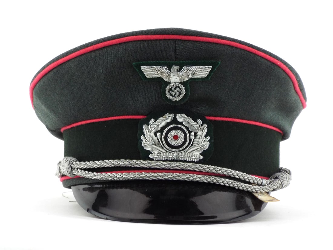 Very Good Quality German Made POST WWII Panzer Officer Visor Cap: Constructed of field grey wool with pink piping for armored units. Dark green felt band features silver bullion wire eagle and oak leaf wreath insignia. Interior shows tan sweatband with silver foil m