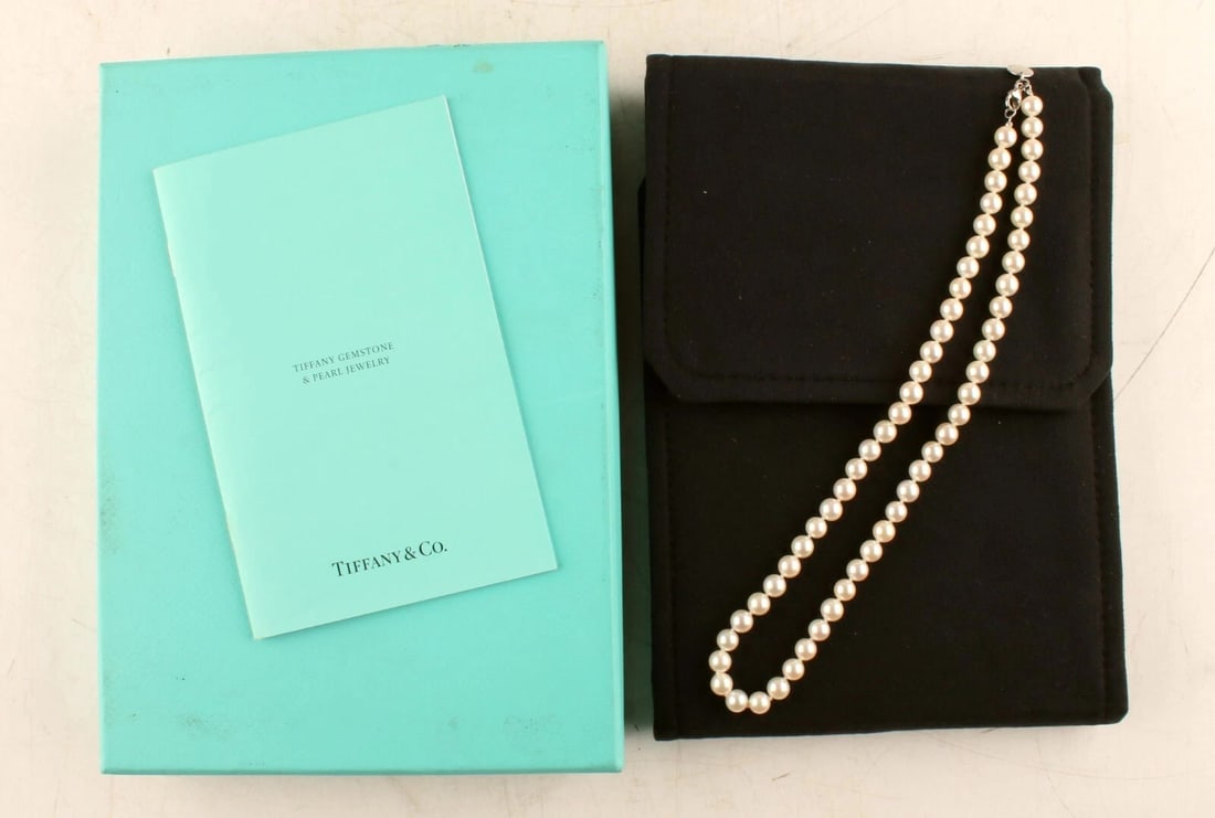 Tiffany Co. Signature Necklace Pearl 18k 750 White Gold: Length - 18". Size of pearl - 7mm. Direct credit card payment will not be accepted for this Lot. Accepted payment methods include cash, certified bank check, wire transfer, and ACH.