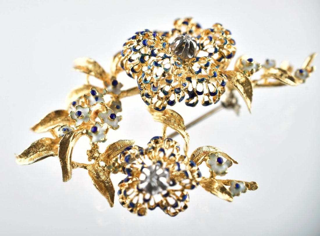 18K Yellow Gold Diamond Blue Enamel Floral Brooch Pin: 2.5" x 1.75". 15.7 grams. Beautiful detail. Marked 18k. Direct credit card payment will not be accepted for this Lot. Accepted payment methods include cash, certified bank check, wire transfer, and AC