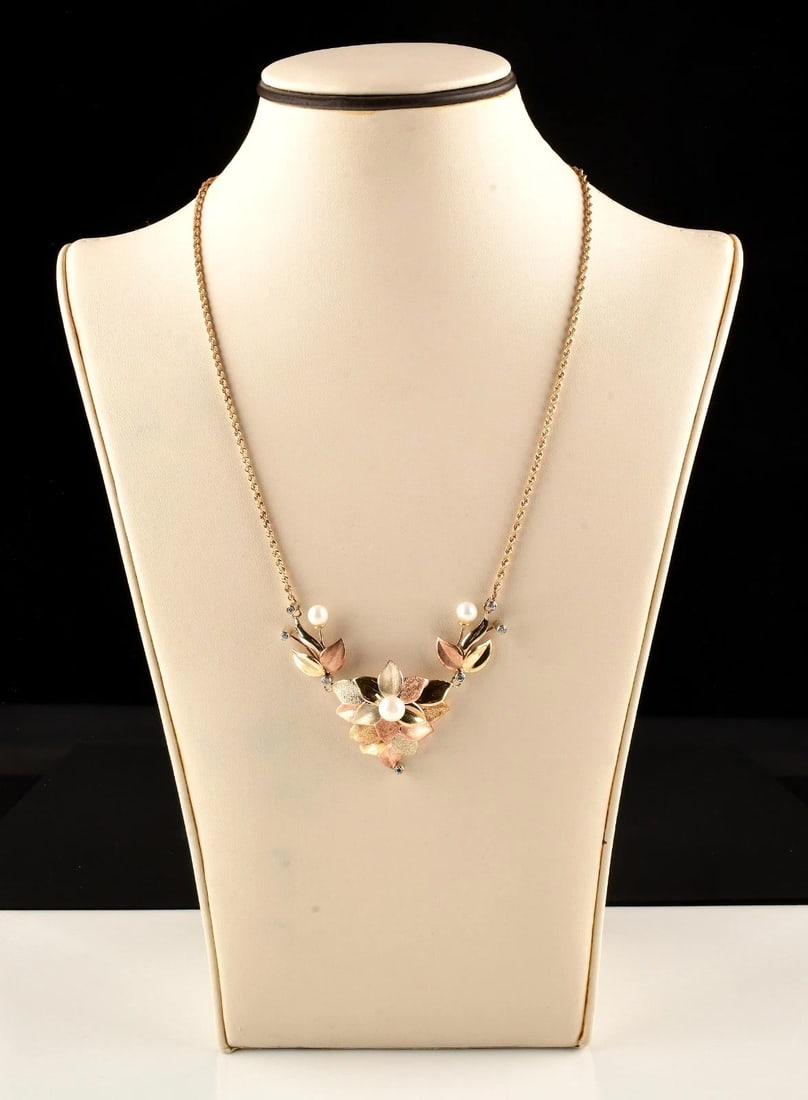 14K Yellow Gold Natural Diamond White Pearl 15" V Shaped Necklace.: Length : 15 inch. Weight : 11.8g. Marks : 14k Mexico. Stone creation : Natural diamonds and pearls. Direct credit card payment will not be accepted for this Lot. Accepted payment methods include cash,