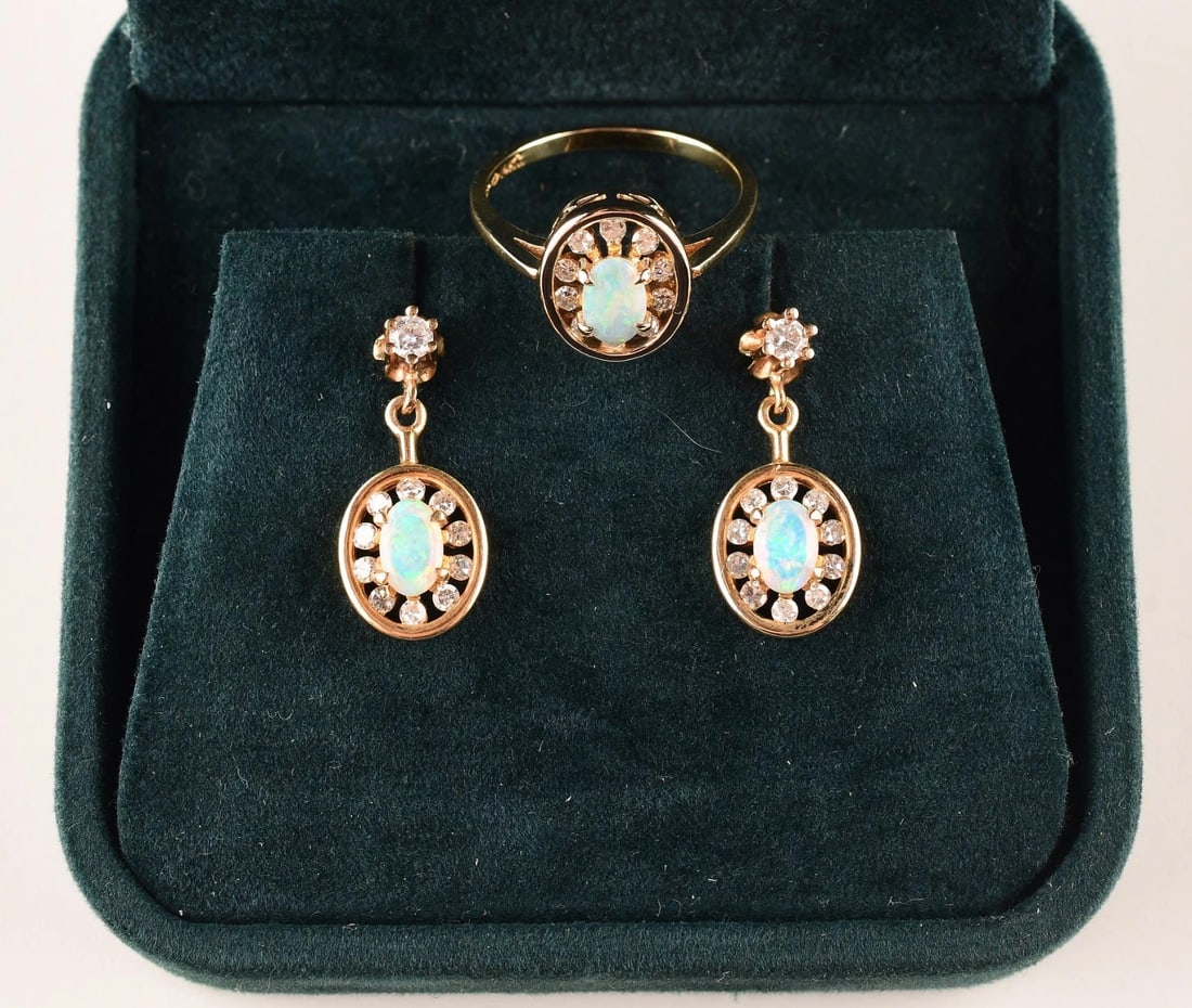 14K Yellow Gold Opal Natural Diamond Stud Earrings: Total Weight : 6.7g. Earrings : 3.7g. Ring : 3g / size 6.5. Stamped : 14k. Size of the stone : 6mm. Length of earring : 22mm. Direct credit card payment will not be accepted for this Lot. Accepted pay