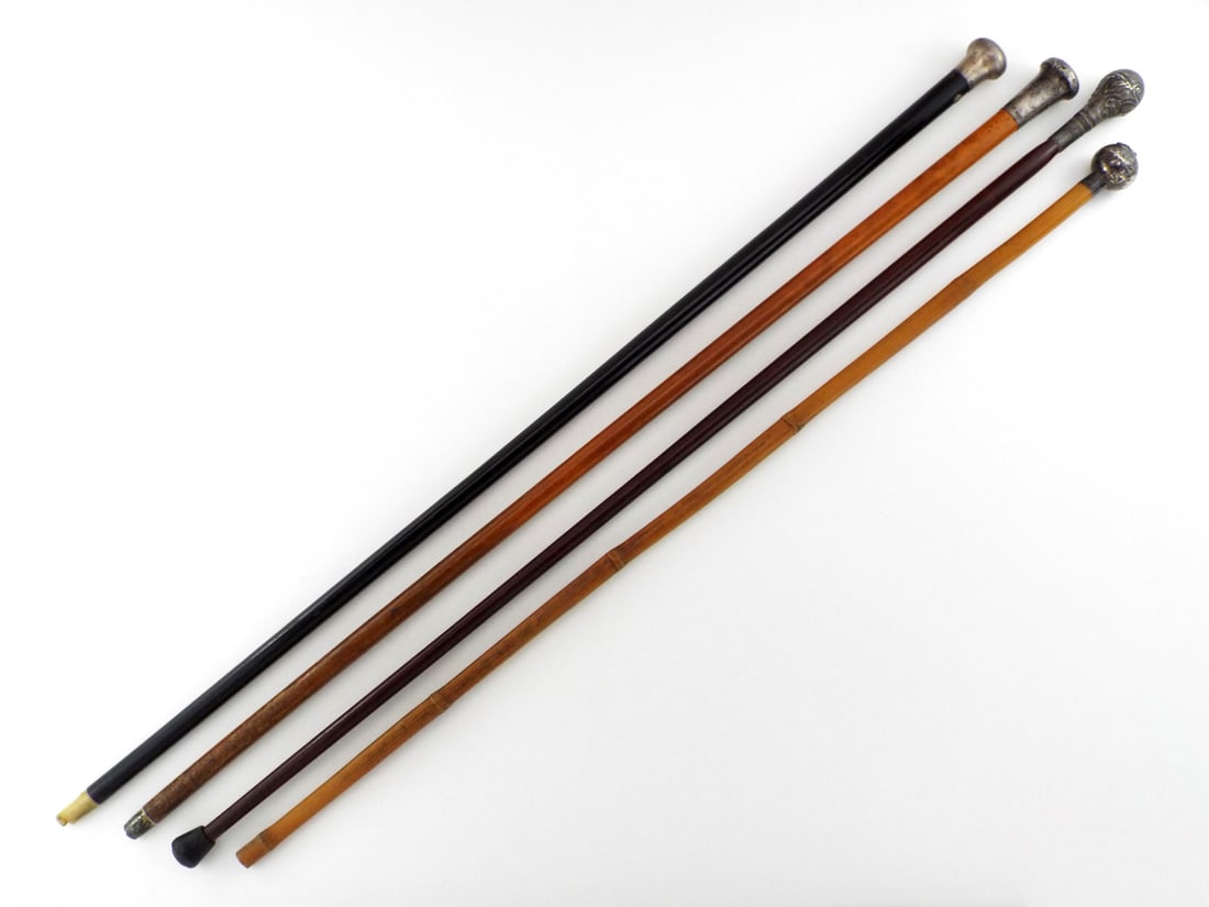 Lot of 4 Very Fine Nobleman Walking Canes with Silver Handles: Lot of 4 Very Fine Nobleman Walking Canes with Silver Handles. Length 36 inches.