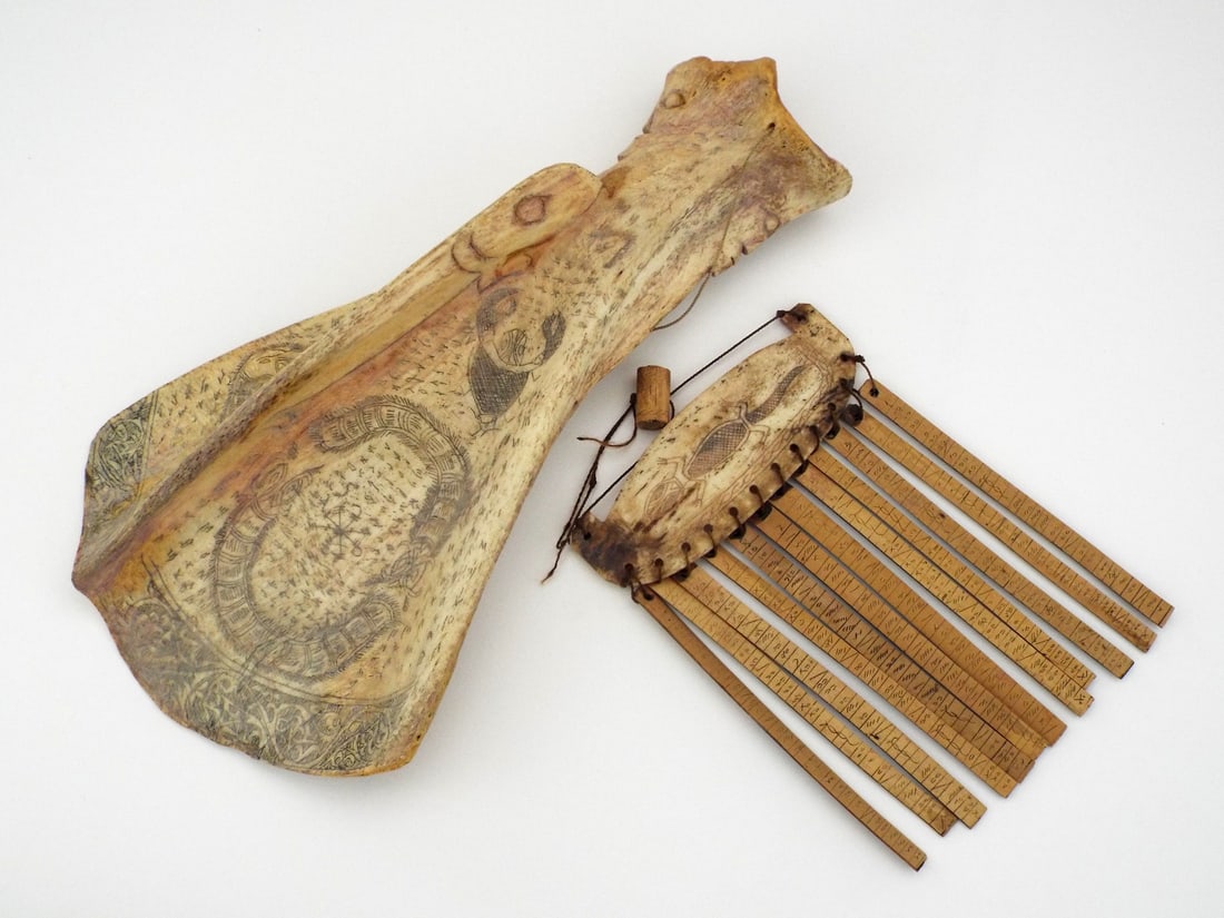 Antique Indonesian SHAMANIC RITUAL CALENDAR & DIVINATION BONE: Carved water buffalo shoulder blade displays honey colored patina with elaborate incised script and central scorpion figure show dark pigment retention with moderate handling wear to the borders. Acco