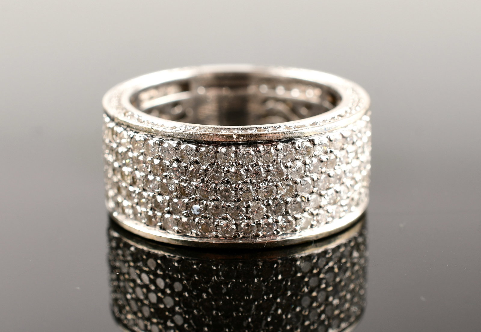 14K White Gold Wide Diamond Pave Band Ring: 14K White Gold Wide Diamond Pave Band Ring, Diamonds 3tcw, Color H, Clairy I, Natural, Size 10 1/4, Weight 14.2g. Direct credit card payment will not be accepted for this Lot. Accepted payment methods