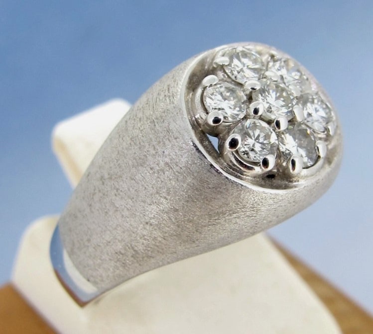 .34 ctw Diamonds Round Cut 14k White Gold Cluster Ring Size 7.: Metal 14k White gold. Weight 8.8 grams. Diamonds approx.34 ctw. Ring size 7 Direct credit card payment will not be accepted for this Lot. Accepted payment methods include cash, certified bank check, w