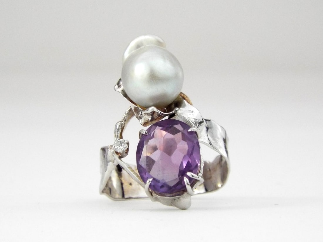 14K White Art Deco Amethyst and Pearl Statement Ring: 14K White Art Deco Amethyst and Pearl Statement Ring, Weight 7.9, Size 11. Unique, custom-made. Direct credit card payment will not be accepted for this Lot. Accepted payment methods include cash, cer