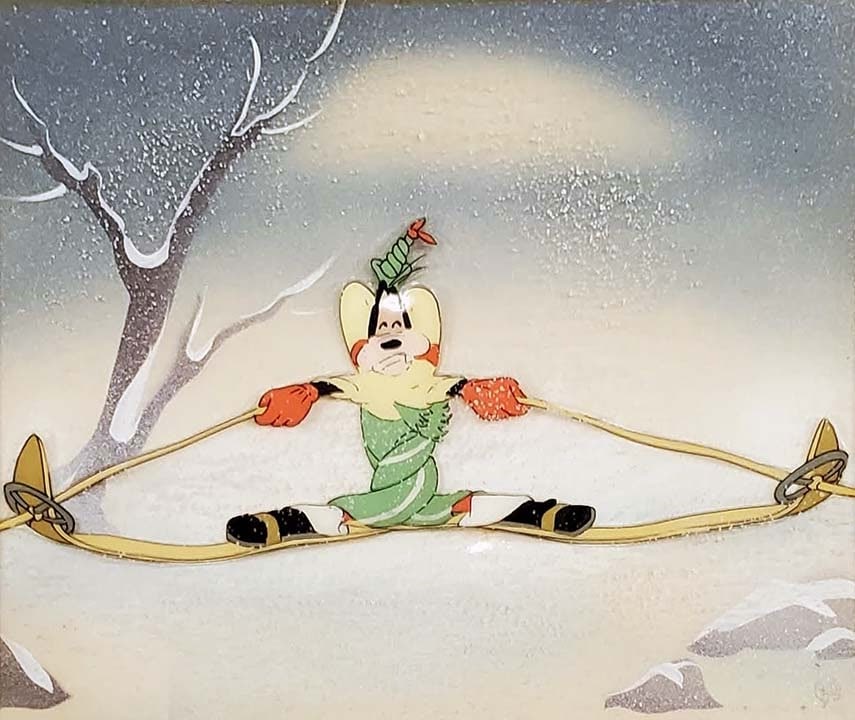 1941 Original Disney Courvoisier Production Celluloid of Goofy from Art of Skiing: This was the first short in Disney's famous Goofy "How To" series. Great fun full-figure image, measuring 4" x 9". Cel is on a Courvoisier custom hand-painted background. The WDP stamp is in the botto