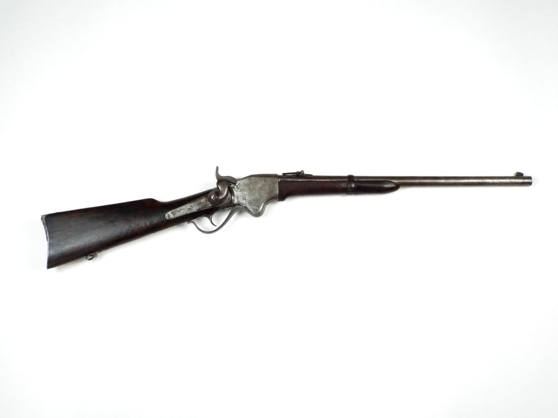 Rare US Civil War SPENCER REPEATING RIFLE CO. 19th New York Cavalry: Receiver and barrel exhibit uniform peppering and a dark oxidation patina with legible patent markings. Serial 47262 identifies 1864 production and correlates to ordnance records for Company F or E of