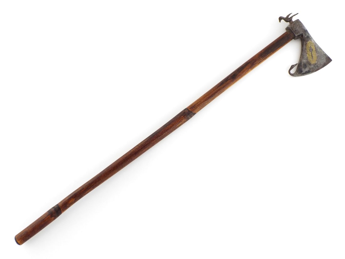 Indian Mughal Axe with BRASS INLAYS & BIRD FINIALS: Forged iron head displays a crescentic blade with a hooked heel and distinctive bird shaped poll. Surface shows heavy salt and pepper spotting and aged patina with two brass overlays. The circular sec