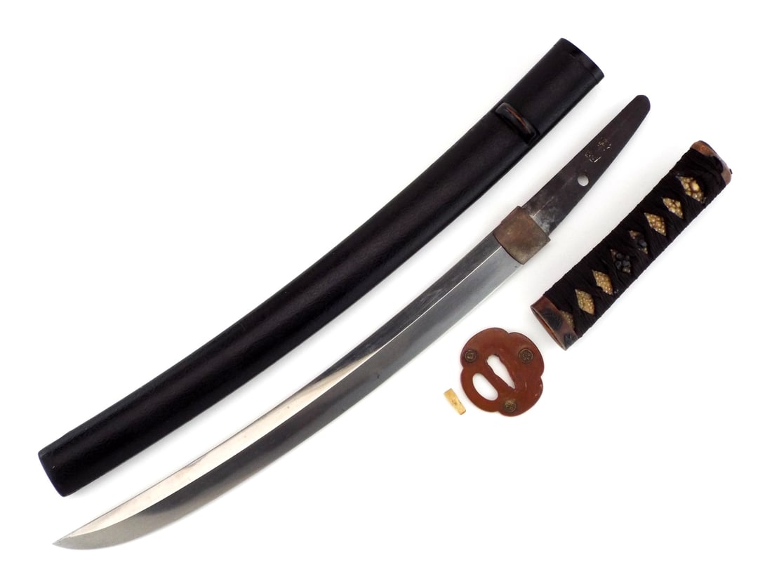 Japanese Samurai Copper Mounted Signed Shobu Zukuri Wakizashi: Signed with a two character signature this very nicely made shobu zukuri wakizashi is from the Edo period and appointed with very attractive all copper fittings inlaid with black shakudo. This blade h